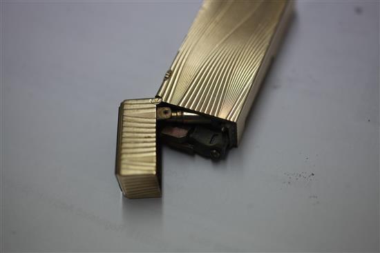 A 1960s 9ct gold Dunhill lighter, approx. 2.5in.